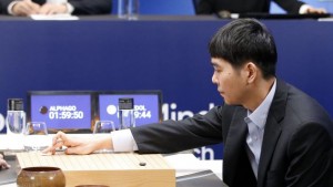 South Korean professional Go player Lee Sedol puts the first stone against Google's artificial intelligence program, AlphaGo during the second match of the Google DeepMind Challenge Match in Seoul, South Korea, Thursday, March 10, 2016. Google's computer program AlphaGo defeated its human opponent, South Korean Go champion Lee Sedol, on Wednesday in the first face-off of a historic five-game match. (AP Photo/Lee Jin-man)